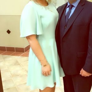 Gorgeous mint A-line dress with butterfly sleeves.